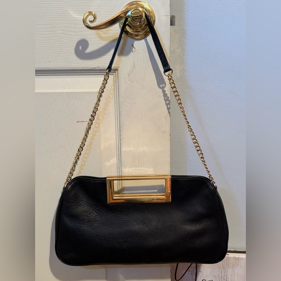 Michael Kors Handbags - Michael Kors Black Leather Clutch w/ Shoulder Strap & Gold Details